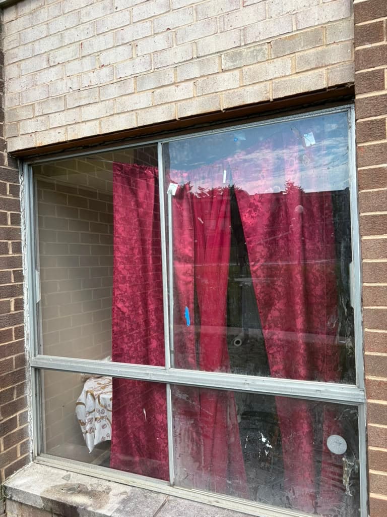 Storefront glazing rebuild — after