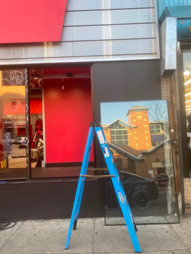 Storefront glass replacement — before