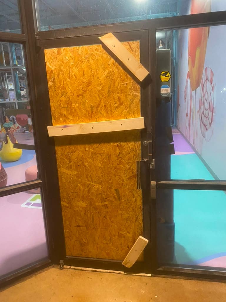 Storefront entry door replacement — before